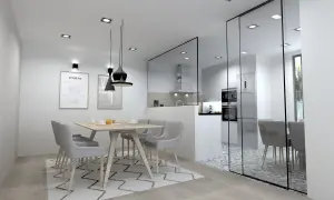 Comedor moderno con **cocina semiabierta cristal**. Mesa de madera con sillas grises, alfombra geométrica y cocina visible tras panel de cristal.