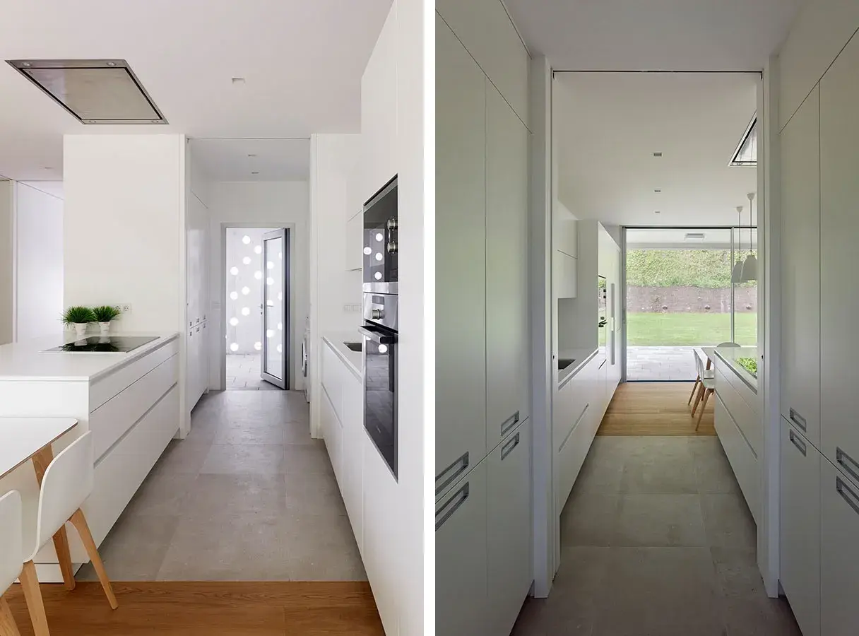 Cocina alargada blanca con encimeras y armarios modernos. Ideas para distribuir una cocina alargada de forma funcional y estilosa.