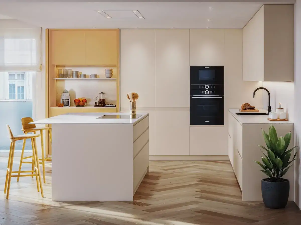 Elegantes colores cocinas modernas: isla central, electrodomésticos integrados y detalles cálidos en madera.